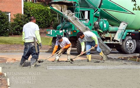 Driveway improvements—planning, options & ideas. Here we are using concrete placers to shape the concrete ...