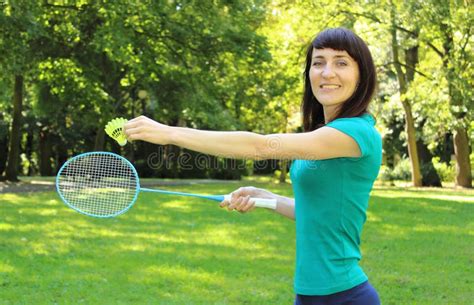 Smiling Woman Playing Badminton In The Summer Park Stock Image Image