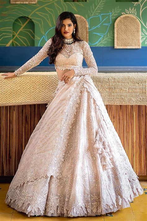 ivory pearl embroidered lehenga set design by anushree reddy at pernia s pop up shop 2024