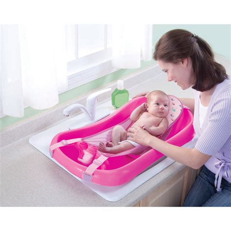 It starts as a newborn bathtub, using a mesh attachment that suspends baby above the water like a hammock. Deluxe Newborn To Toddler Tub (Pink) baby bath tub w/sling ...