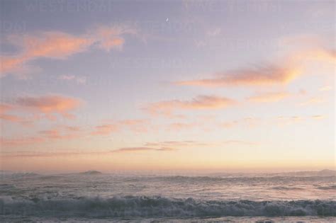 Seascape With Cloudy Sky At Sunset Stock Photo