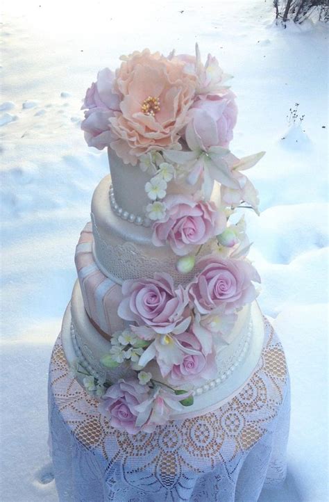 Looking for dainty floral cakes that won't hurt your budget? Pastel floral wedding cake - Cake by TheArtofCakes ...