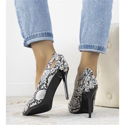 Black And White Heels With Decorative Cutouts From Caley Keeshoes