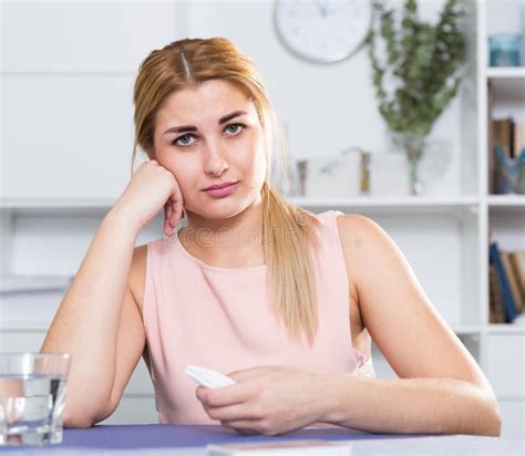 Sad Woman Is Sitting At The Table Alone And Upset Stock Image Image Of Solitude Sorrow 261781485