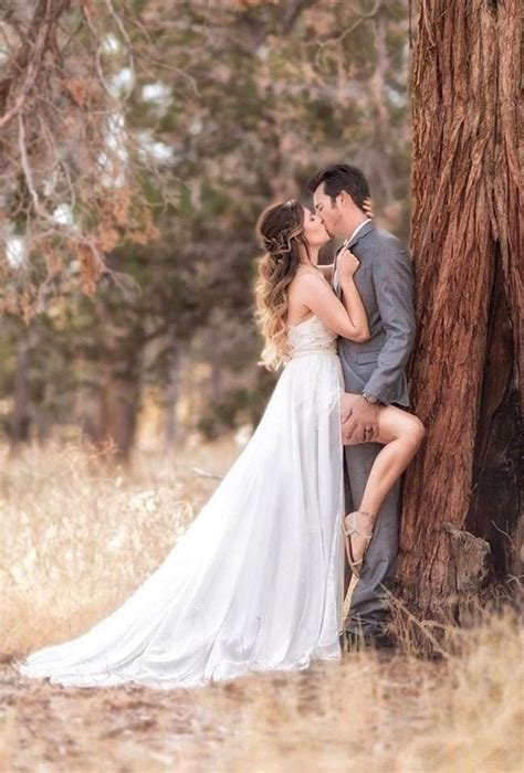 Romantic Wedding Kiss Near Tree Michaelanthonyphotography