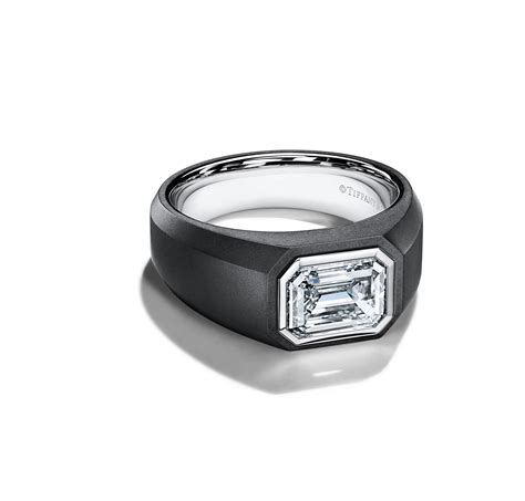 the charles tiffany setting engagement ring in black titanium and platinum with an emerald cut