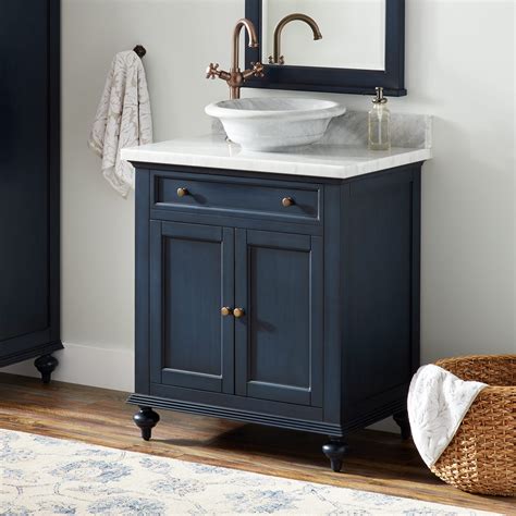 This bathroom is cleverly designed the way the blue and white tiling from the main area of the bathroom, where the vanity and sink is, continues into the shower room. 30" Keller Mahogany Vessel Sink Vanity - Vintage Navy Blue ...