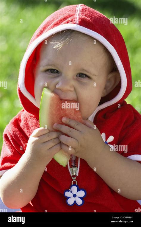 Baby Eating Watermelon Stock Photo Alamy