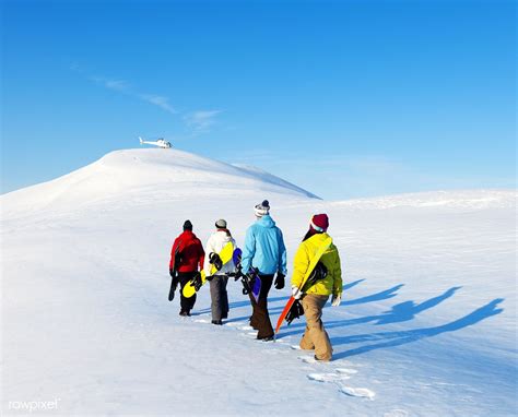 Check spelling or type a new query. Download premium image of Group of snowboarders enjoying a ...