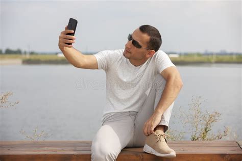 Handsome Young Man Sitting Bench Smiling Candid Stock Photos Free