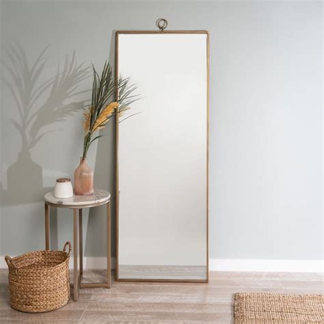 Shop for floor mirrors, wall mirrors & vanity mirrors plus other wall décor at pier 1. Metal Frame 65" Floor Mirror, Antique Gold