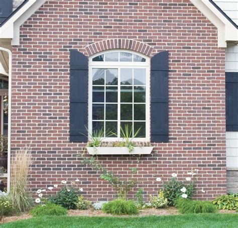 Handcrafted country style rustic exterior shutters. MidAmerica premium decorative Board & Batten arch-top ...