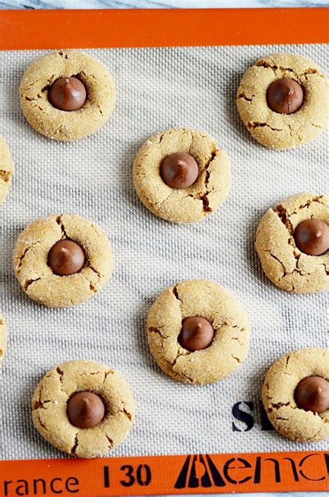 These can be eaten warm, but if you're taking them somewhere, wait until the cookies have cooled completely before transporting. Hershey Kiss Gingerbread Cookies - White Chocolate Topped ...