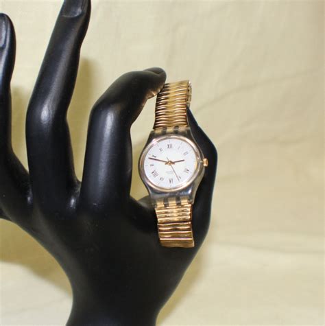 Unusual Swatch Swiss Wrist Watch 227 Gold Flex Metal Band Etsy Canada Wrist Watch Women