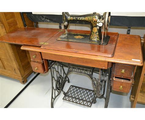 singer treadle sewing machine w cabinet