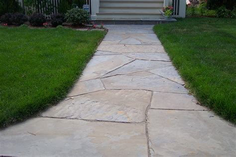 Decorating Attractive Green Grass Combine With Flagstone Walkway For