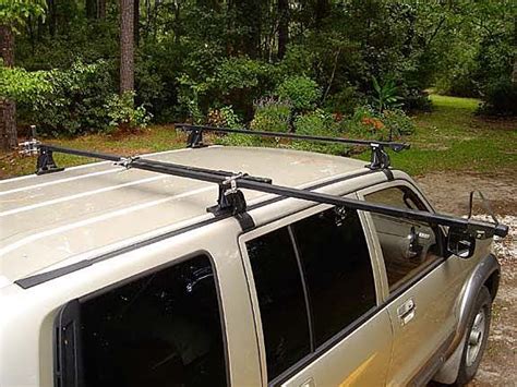 The rear loading yakima showboat loader bar seems the most practical but is expensive. Hobie Forums • View topic - Rooftopping a Hobie: Using a Kayak Loading Bar