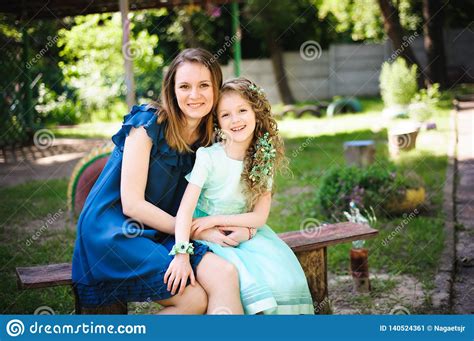 Happy Mother And Daughter Together In A Summer Park Outdoors Stock Image Image Of Hugging