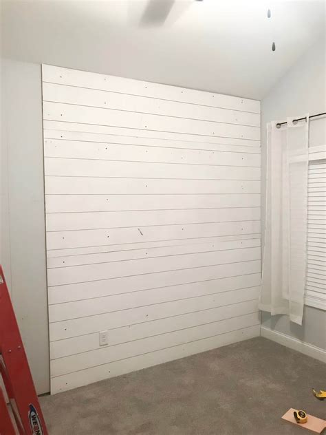 Even before we sold our old house, i was planning every nook and cranny of our new house. DIY Faux Shiplap Wall in the Nursery | A Hosting Home