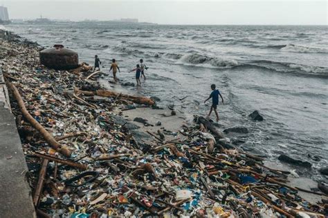 Shocking Photos Of Manila Streets Literally Flooded With Trash Show Why