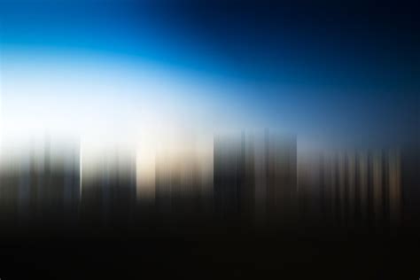 Blurred Skyscrapers In Daylight Background Custom Designed