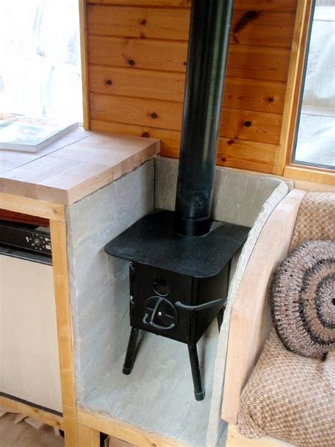 However, wood gas is also made by heating wood in an enclosed container, causing the wood to char (carbonize) and release wood gas. DIY House on Wheels | Portable house, Mini wood stove, Garage design interior