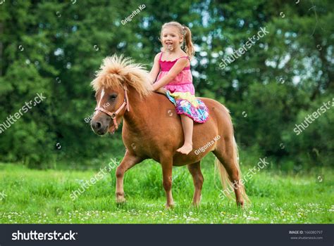 Little Girl Riding Little Pony Stock Photo 166080797 Shutterstock