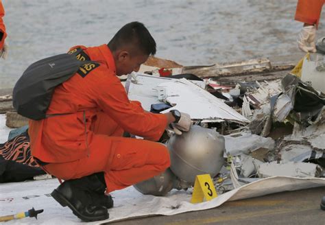 indonesia plane crash search finds remains debris at sea 660 news