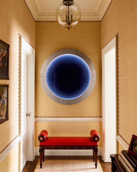 Bold Contemporary Art Hangs Above A Tailored Regency Bench For A