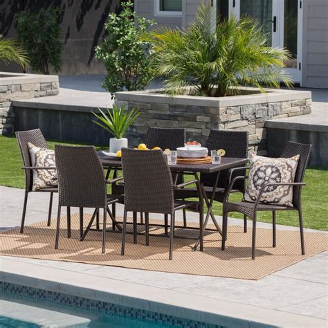 Brown metal outdoor dining set. Noble House Multi-Brown 7-Piece Wicker Rectangular Outdoor ...