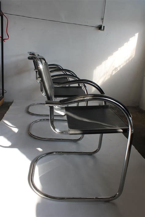 Set Of Four Tubular Steel And Leather Dining Chairs By Matteo Grassi Bauhaus For Sale At 1stdibs