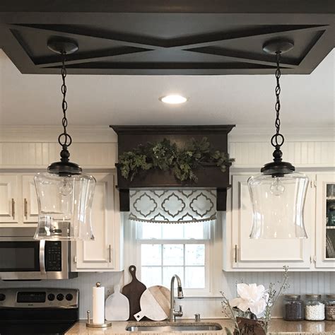 Modern pendant lights, suspended over a kitchen island or bar, are almost always a winning design element—and instant kitchen focal point. Modern farmhouse kitchen island lighting. Love our custom ...