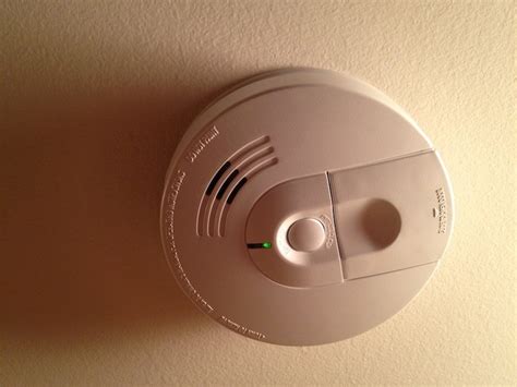 Smoke alarms installed in the basement should be installed on the ceiling at the bottom of the stairs leading to the next level. How to Check and Replace a Smoke Detector / CO Battery ...