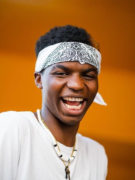 Premium Photo Shallow Focus Shot Of A Young Black Male On A Yellow