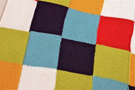 How do i knit a baby blanket? adventuruss: a checkered knit blanket.