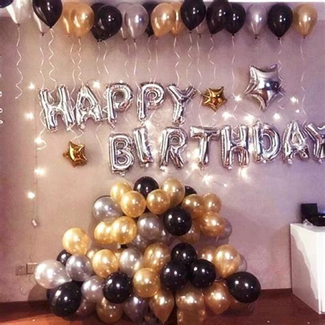 18 happy birthday message made of golden inflatable balloon eighteen letters isolated on black background fly on gold ribbons with. 1 set silver happy birthday letter globos with pearl gold ...