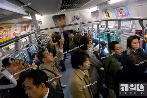 Commuters Inside Train In Rush Hour Tokyo Subway Tokyo Honshu Japan Asia Stock Photo