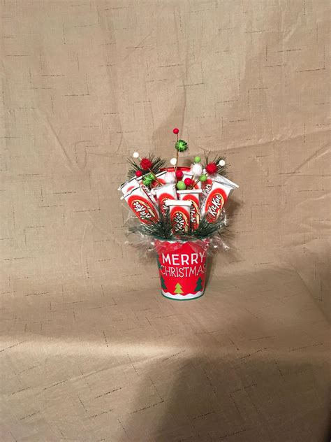 A very merry christmas and a happy new year. Merry Christmas Candy Bouquet - Holiday Candy Bouquet ...