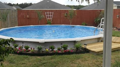 A simple, modern pool deck that goes around the pools is often one of the a tropical oasis is another natural option for those with above ground pools. Above Ground Pool Landscape Design Ideas - YouTube