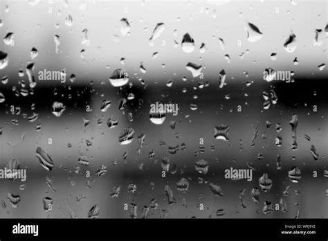 Full Frame Shot Of Wet Window In Rainy Season Stock Photo Alamy