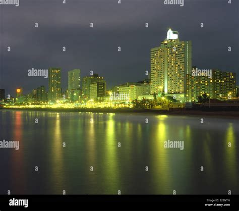 Durbans Golden Mile At Night With Lights Reflected In The Water Stock