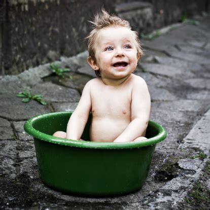 How often to bathe a baby. Baby Bath In Wash Tub Stock Photo - Download Image Now ...