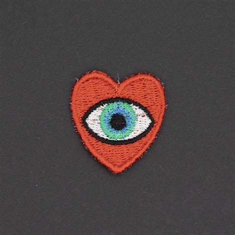 small heart and eye embroidered patch the unruly stitch