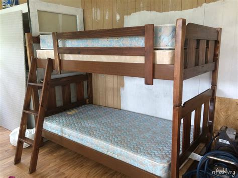 White bunk bed with navy bedding. Updated & Painted Bunk Beds - Refresh Living