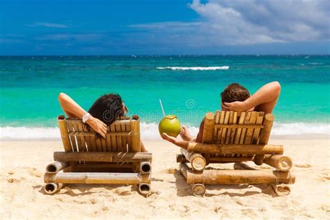 Beach Summer Couple On Island Vacation Holiday Relax In The Sun Stock