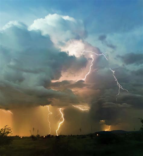 A Chaotic Thundercloud With Lightning Strikes Within Photograph By