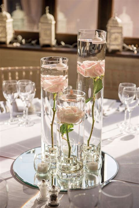 You can get them from any floral supply store or website. These glass, mirror and rose table centres scream ...