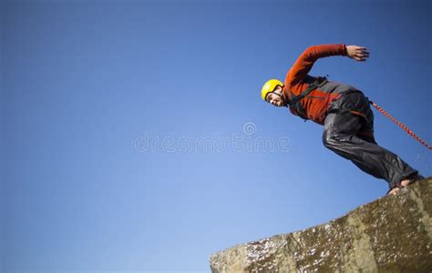 Jump Off A Cliff With A Rope Stock Photo Image Of Freedom Mountain