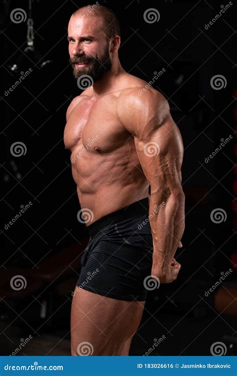Muscular Man Flexing Muscles Side Triceps Pose Stock Photo Image Of