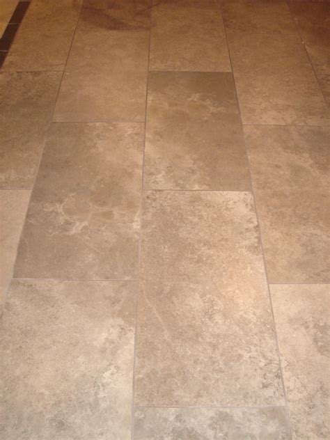 A Rectangular Floor Tile Is Shown